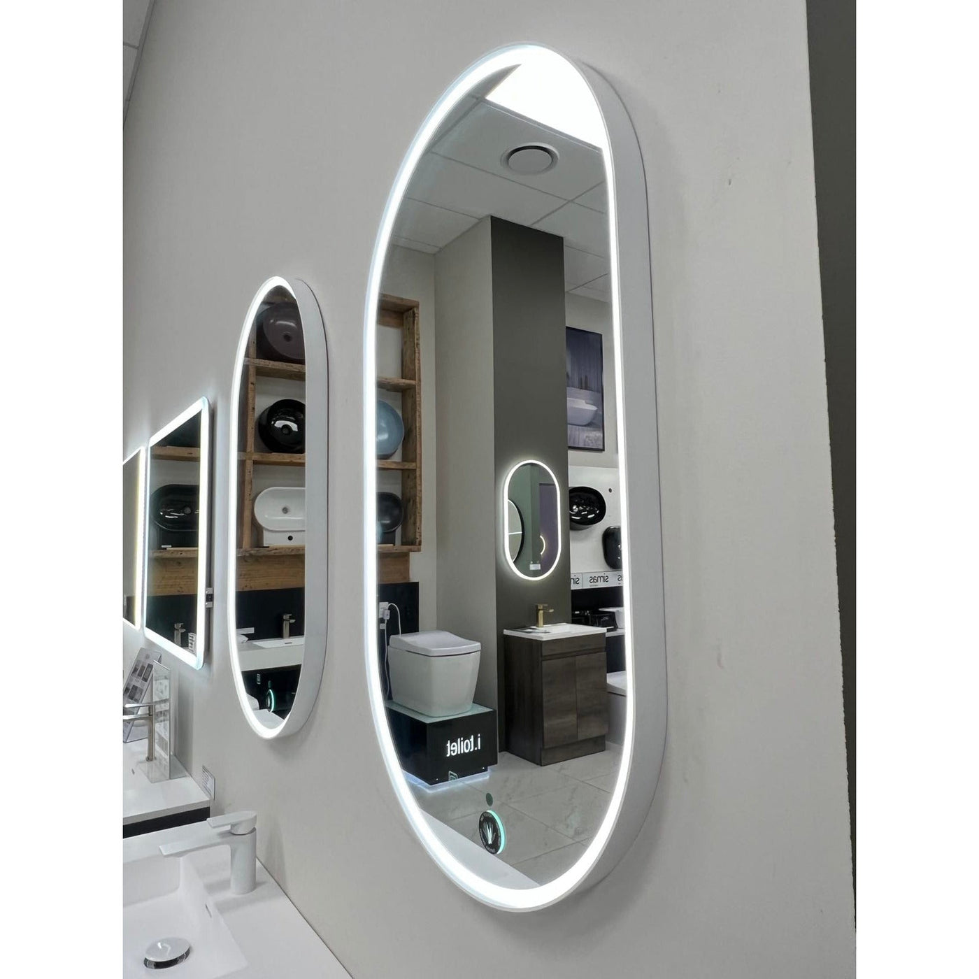 Framed Oval LED Mirror with a Demister and Two Brightness Levels - Mirror World